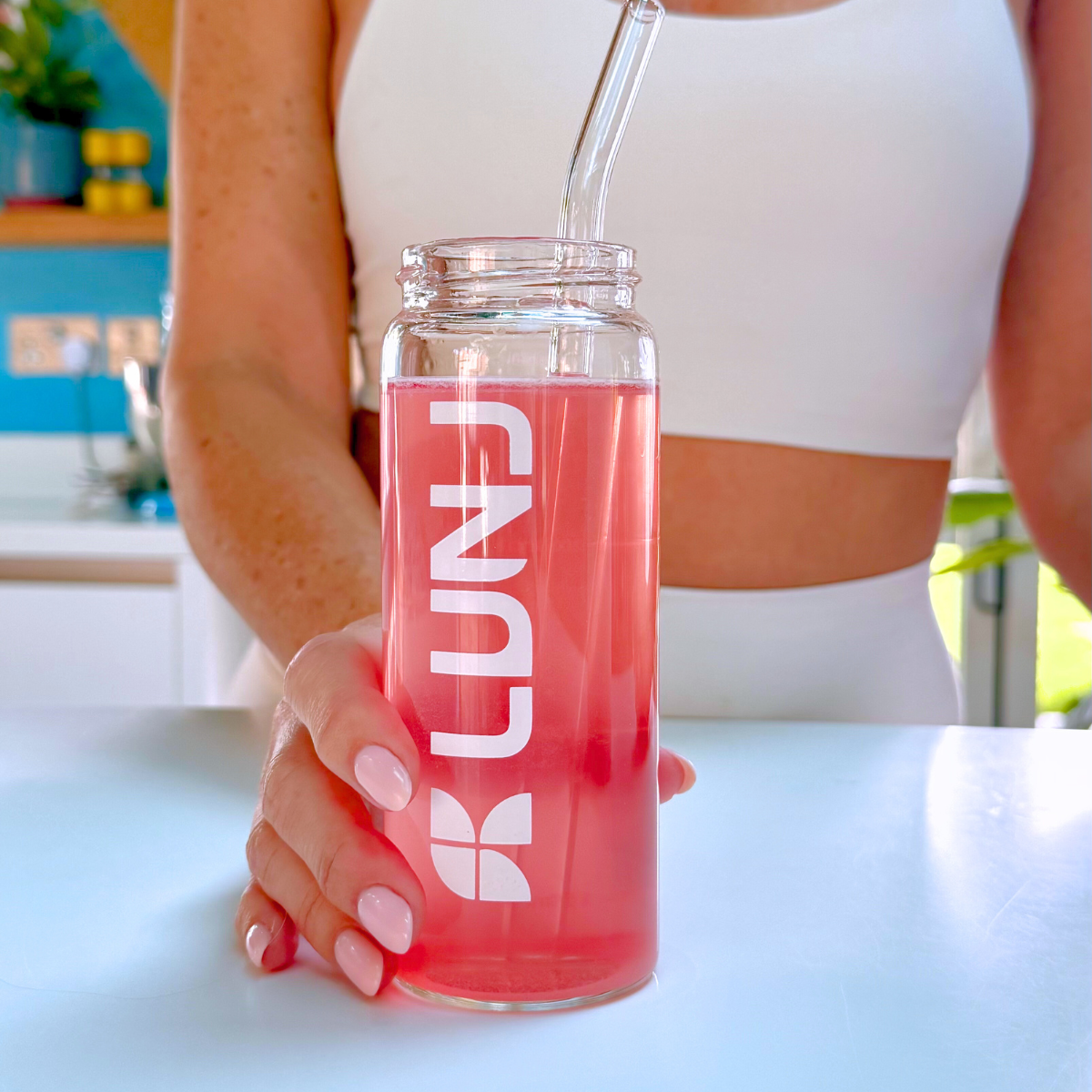 LUNJ FitGlo drink in logo bottle